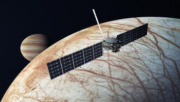 Illustration: Europa Clipper above Europa, with Jupiter in background