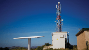 Project Kuiper terminal with cell tower in background